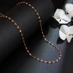 Delicate women's rose gold-colored chain with decorative flat links