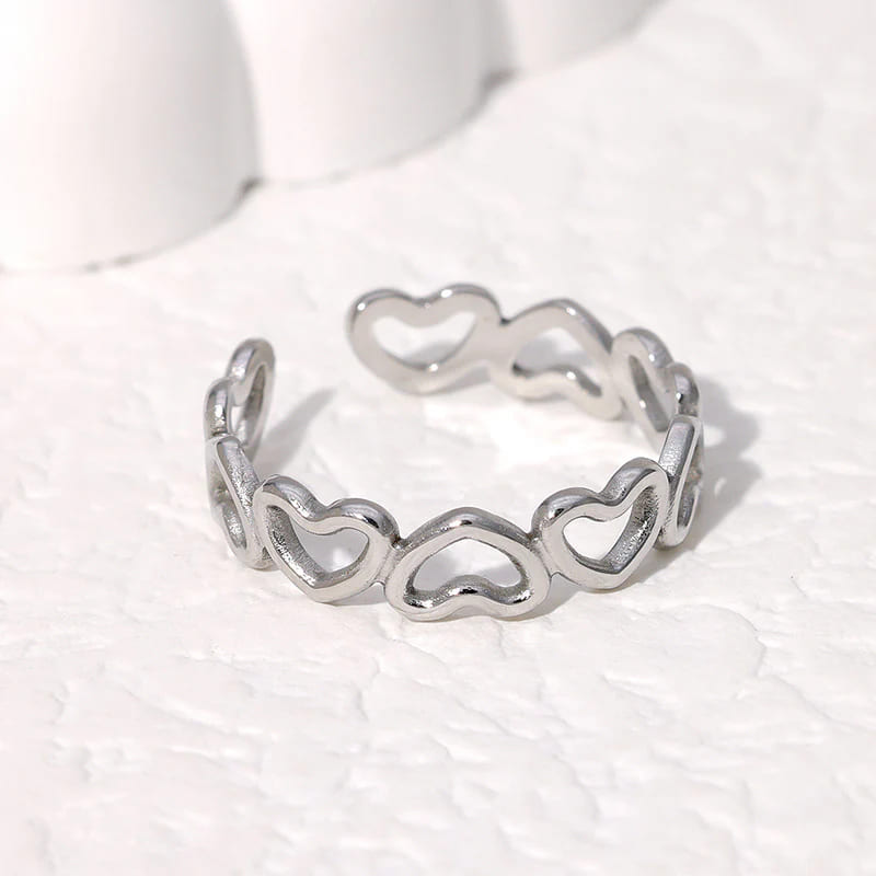 Silver Adjustable Surgical Steel Ring with a Row of Linked Hearts