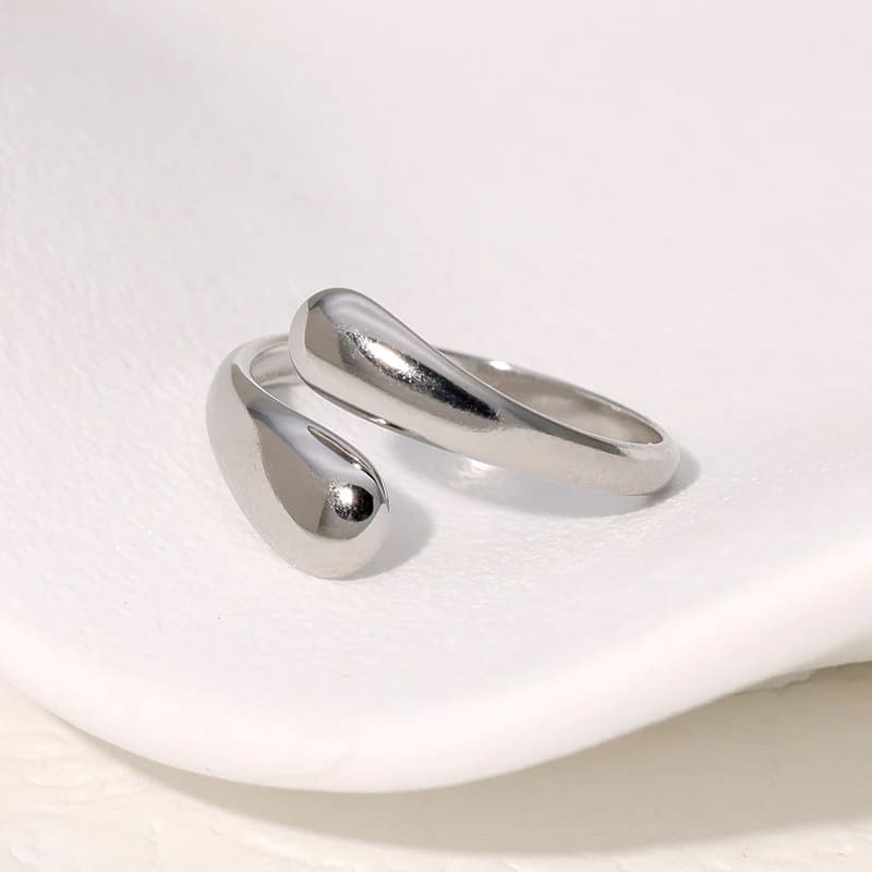 Modern silver ring with an open teardrop design